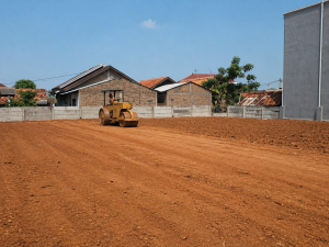 jasa pengurugan profesional dengan alat berat dan dump truck